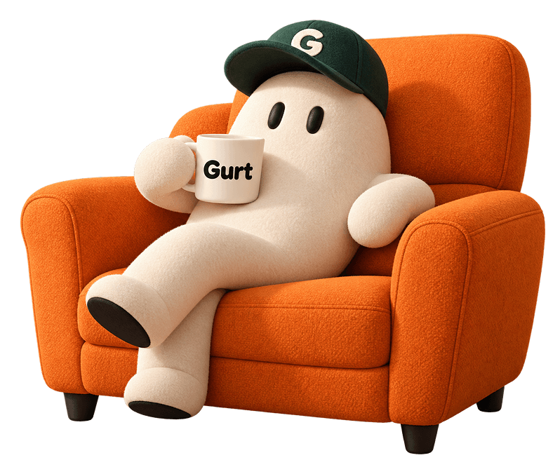 Gurt relaxing in an orange chair with a coffee mug